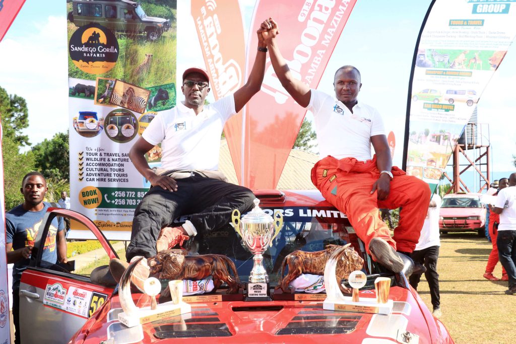 Byron Rugomoka (left) and co-driver Hakim Mawanda (right) after their win in Rukungiri